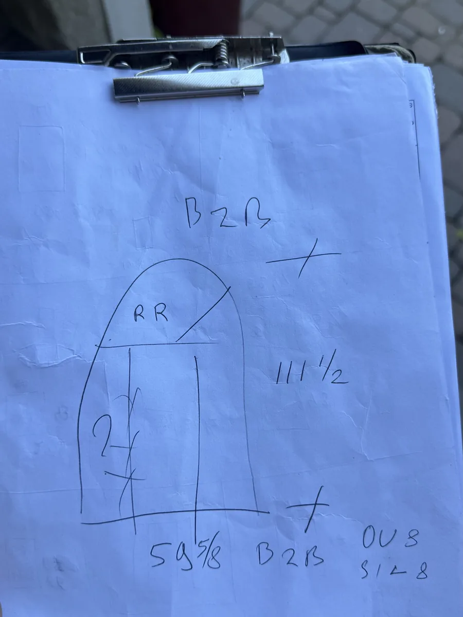 The installer's on-site sketch of the arched entry system with its measurements